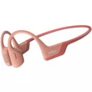 Shokz OpenRun PRO Bluetooth fejhallgató a fül előtt, rózsaszínű